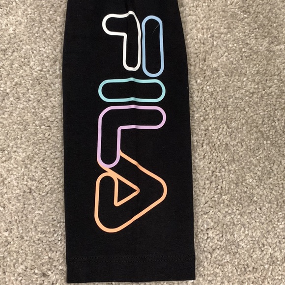 Never worn Fila leggings! Black leggings with Fila logo on left pant leg. - Picture 3 of 3